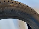 a close up of a tire on a white surface