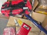 a box of tools that are sitting on the floor