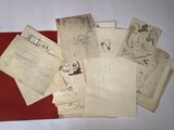 a lot of old papers that are on a table