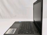 an open laptop computer sitting on top of a white table