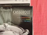 two boxes of casserole sitting on top of a red cloth