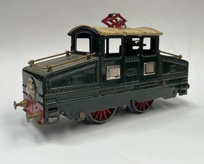 a toy train that is sitting on a white surface