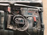 a tool in a case that is sitting on the floor