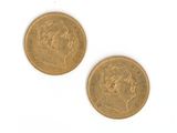 two gold sovereigns, one of which has a woman ' s head and the other of which is a