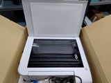 an open box with a printer inside of it
