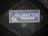 a patch on the back of a motorcycle with the words intermag on it