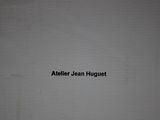 an image of a picture of a white box with the words atelier jean huguett on it