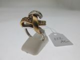 une image représentant une bague en or et en argent sertie de diamants