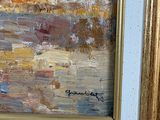 an oil painting of a cityscape in a gold frame on a red wall