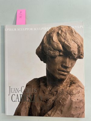 a picture of a sculpture of a woman on a wall