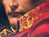 a picture of a man in a red coat with a gold collar