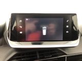 a picture of a car ' s dashboard with a digital display