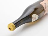 a bottle of wine that is sitting on a table