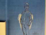 a blue book with a drawing of a man on it