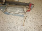 a metal machine that is sitting on the floor