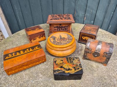 many wooden boxes and boxes on a table