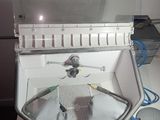 a sink with a drain and a faucet in it