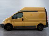 a yellow van that is parked in a parking lot