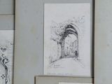 sketches and drawings of a doorway in a building with a clock on the wall
