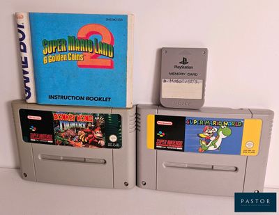 two nintendo game cartridges sitting next to each other on a table