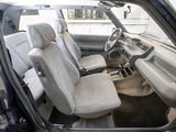 a picture of the interior of a car with the door open