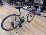 a bike that is sitting on a stand in a store