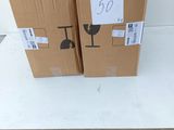 two boxes that are sitting on top of a table