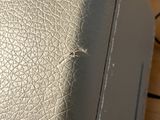 a close up of a piece of leather on a table