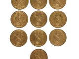 a group of six gold sovereigns of various sizes and shapes