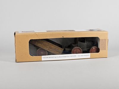 une image représentant une boîte contenant un camion jouet