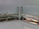 two mirrors that are sitting side by side on a table
