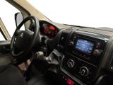the interior of a car with a steering wheel and dashboard controls