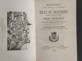 an open book with a drawing of a castle on it