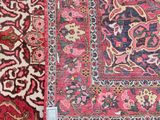 a close up of a rug on a tiled floor