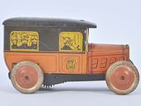 a toy car that is sitting on a white surface