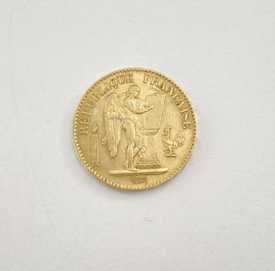 une image d'une pièce d'or sur une surface blanche