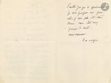 an old letter with a handwritten message on it sitting on top of a piece of paper