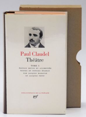 the book is open to show a picture of a man in a suit and tie