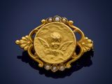 une image représentant une pièce d'or sur laquelle figure un crâne