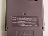 a close up of a nintendo game on a white surface