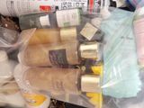 many different types of skin care products in a plastic bag