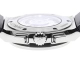 a close up of a watch on a white surface with a white background