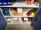 a shelf that has many different items on it