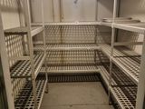 a long shelf in the middle of a room