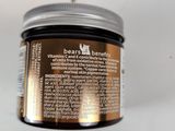an image of a close up of a jar of hair product