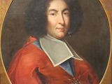 portrait of a man in a red coat and white collar