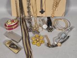 a lot of jewelry that is sitting on a table