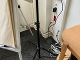 a picture of a photo studio set up in the corner of a room