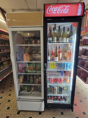 a refrigerated refrigerator in a grocery store