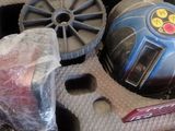a bag with a helmet and other items inside of it